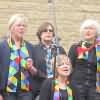 Silsden Singers – Welcoming the Olympic Torch to Keighley in June 2012.